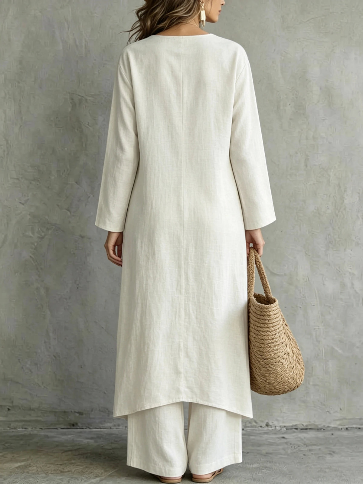 Ensemble pantalon avec tunique asymétrique à boutons décoratifs